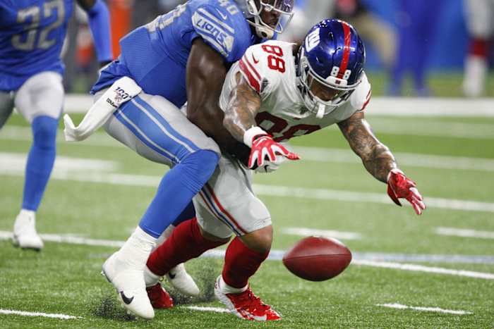 Oct 27, 2019; Detroit, MI, USA; New York Giants tight end Evan Engram (88) unable to make a catch against Detroit Lions middle linebacker Jarrad Davis (40) during the third quarter at Ford Field.